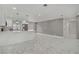 Bright living room with open floor plan and decorative accent wall at 4490 W Warm Springs Rd, Las Vegas, NV 89118