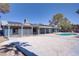 Home's inviting pool and spacious patio make it ideal for entertaining at 4490 W Warm Springs Rd, Las Vegas, NV 89118