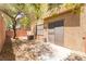 Backyard featuring a block wall, patio, and desert landscaping at 455 Westminster Hall Ave # 101, North Las Vegas, NV 89032