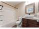 Modern bathroom with decorative vessel sink and shower over tub at 455 Westminster Hall Ave # 101, North Las Vegas, NV 89032