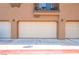 Attached two-car garage in a well maintained stucco building with balcony at 455 Westminster Hall Ave # 101, North Las Vegas, NV 89032