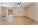 Open-concept living space featuring stylish flooring, with access to the backyard at 455 Westminster Hall Ave # 101, North Las Vegas, NV 89032