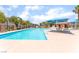 Enjoy a refreshing dip in this community pool, complete with lounge chairs and shaded tables at 455 Westminster Hall Ave # 101, North Las Vegas, NV 89032