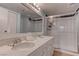 Bright bathroom features a double vanity with shower at 4742 Obannon Dr # A, Las Vegas, NV 89102