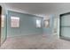 Spacious bedroom with lots of natural light and carpet flooring at 4742 Obannon Dr # A, Las Vegas, NV 89102