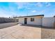 Inviting exterior of a renovated home featuring a new door and concrete driveway at 5069 Hallet Dr, Las Vegas, NV 89122