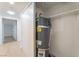 Water heater in closet with built in shelves and hallway access at 5069 Hallet Dr, Las Vegas, NV 89122