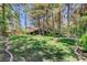 Large backyard with mature trees and beautiful landscaping at 5260 N Jones Blvd, Las Vegas, NV 89130