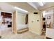View of laundry area connecting to bathroom and recreational area, featuring tiled flooring at 5260 N Jones Blvd, Las Vegas, NV 89130