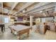 Finished basement with a pool table, bar area, and comfortable seating; perfect for entertainment at 5260 N Jones Blvd, Las Vegas, NV 89130