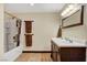 Bathroom featuring a vanity with double sinks and a bath/shower combination at 5260 N Jones Blvd, Las Vegas, NV 89130