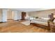 Expansive bedroom with hardwood floors, furnishings, and a walk in closet at 5260 N Jones Blvd, Las Vegas, NV 89130