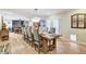 Dining room featuring a long table, natural light, and comfortable seating at 5260 N Jones Blvd, Las Vegas, NV 89130