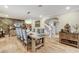 Cozy dining room featuring a chandelier and adjacent stairwell access at 5260 N Jones Blvd, Las Vegas, NV 89130
