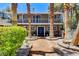 Charming two-story home with a welcoming front yard, mature trees, and delightful curb appeal at 5260 N Jones Blvd, Las Vegas, NV 89130