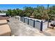 Expansive aerial view highlighting a property with metal buildings, ample parking, and secure fencing on a clear day at 5260 N Jones Blvd, Las Vegas, NV 89130