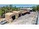 Aerial view showcasing multiple metal garages or storage units with a spacious parking area on a sunny day at 5260 N Jones Blvd, Las Vegas, NV 89130