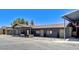Commercial building exterior with multiple entrances and ample parking space at 5260 N Jones Blvd, Las Vegas, NV 89130