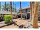 Beautiful home with inviting front yard, mature trees, and a charming brick pathway at 5260 N Jones Blvd, Las Vegas, NV 89130
