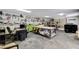 Organized garage featuring a workbench, storage shelves, and plenty of space for crafting or DIY projects at 5260 N Jones Blvd, Las Vegas, NV 89130