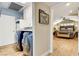 Modern laundry room with washer and dryer; access to bedroom at 5260 N Jones Blvd, Las Vegas, NV 89130