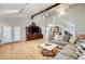 Open-concept living room with a staircase, modern furniture, and stylish decor at 5260 N Jones Blvd, Las Vegas, NV 89130