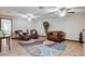 Cozy living room with ceiling fans, hardwood floors, and comfortable seating perfect for relaxation at 5260 N Jones Blvd, Las Vegas, NV 89130