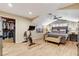 Serene main bedroom with wood accents, modern decor, and exercise equipment at 5260 N Jones Blvd, Las Vegas, NV 89130