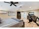 Bright main bedroom with vaulted ceilings, modern furnishings, and exercise equipment at 5260 N Jones Blvd, Las Vegas, NV 89130
