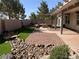 Beautiful backyard featuring a garden, patio area, and desert landscaping at 5363 S Juneau St, Pahrump, NV 89061