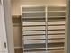 An organized walk-in closet featuring built-in shelving and drawers at 5363 S Juneau St, Pahrump, NV 89061