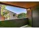 View from a condo balcony showcasing an attractive complex with lush landscaping and mature trees at 555 E Silverado Ranch Blvd # 2129, Las Vegas, NV 89183