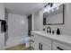 Updated bathroom featuring modern fixtures, a sleek vanity, and a tiled shower/tub combo at 555 E Silverado Ranch Blvd # 2129, Las Vegas, NV 89183