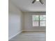 Light-filled bedroom with wood-look flooring and a large window offering pleasant views at 555 E Silverado Ranch Blvd # 2129, Las Vegas, NV 89183