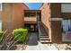 Exterior view of a building entrance with a staircase and pathway to the units at 555 E Silverado Ranch Blvd # 2129, Las Vegas, NV 89183
