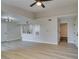 Bright living area features wood-look floors, a ceiling fan, and lots of natural light at 555 E Silverado Ranch Blvd # 2129, Las Vegas, NV 89183