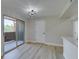 Bright living area features wood-look floors, a ceiling fan, and lots of natural light at 555 E Silverado Ranch Blvd # 2129, Las Vegas, NV 89183