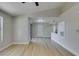 Bright living area features wood-look floors, a ceiling fan, and lots of natural light at 555 E Silverado Ranch Blvd # 2129, Las Vegas, NV 89183