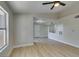 Bright living area features wood-look floors, a ceiling fan, and lots of natural light at 555 E Silverado Ranch Blvd # 2129, Las Vegas, NV 89183