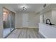 Bright living area features wood-look floors, a ceiling fan, and lots of natural light at 555 E Silverado Ranch Blvd # 2129, Las Vegas, NV 89183