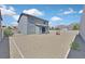 Expansive backyard space with mountain views, offering potential for landscaping and recreation at 5923 Halehaven Dr, Las Vegas, NV 89110