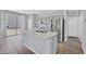 Modern kitchen with an island, stainless steel appliances, and ample counter space at 5923 Halehaven Dr, Las Vegas, NV 89110