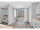 Bright breakfast nook with sliding glass doors and access to the backyard at 5923 Halehaven Dr, Las Vegas, NV 89110