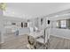 Open-concept layout featuring dining, kitchen, and living areas at 5923 Halehaven Dr, Las Vegas, NV 89110