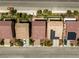 Overhead view showcasing houses with desert landscaping, solar panels, and driveway parking at 6014 Belvedere Canyon Ave, Las Vegas, NV 89139
