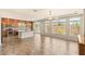 Open-concept room features tile flooring and seamless access to the gourmet kitchen at 6014 Belvedere Canyon Ave, Las Vegas, NV 89139