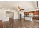 Spacious living area featuring tile flooring and a connected kitchen at 6014 Belvedere Canyon Ave, Las Vegas, NV 89139