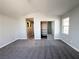 Large bedroom showcasing soft carpet, a walk-in closet, and ample natural light at 6063 Peach Orchard Rd, Las Vegas, NV 89142