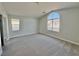Inviting bedroom offering soft carpet, abundant natural light, and a closet at 6063 Peach Orchard Rd, Las Vegas, NV 89142