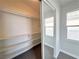 Functional closet with shelving and a view of the bedroom at 6063 Peach Orchard Rd, Las Vegas, NV 89142
